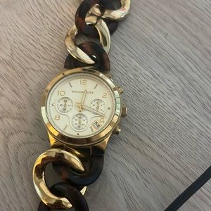 Tortious and gold Micheal Kora watch